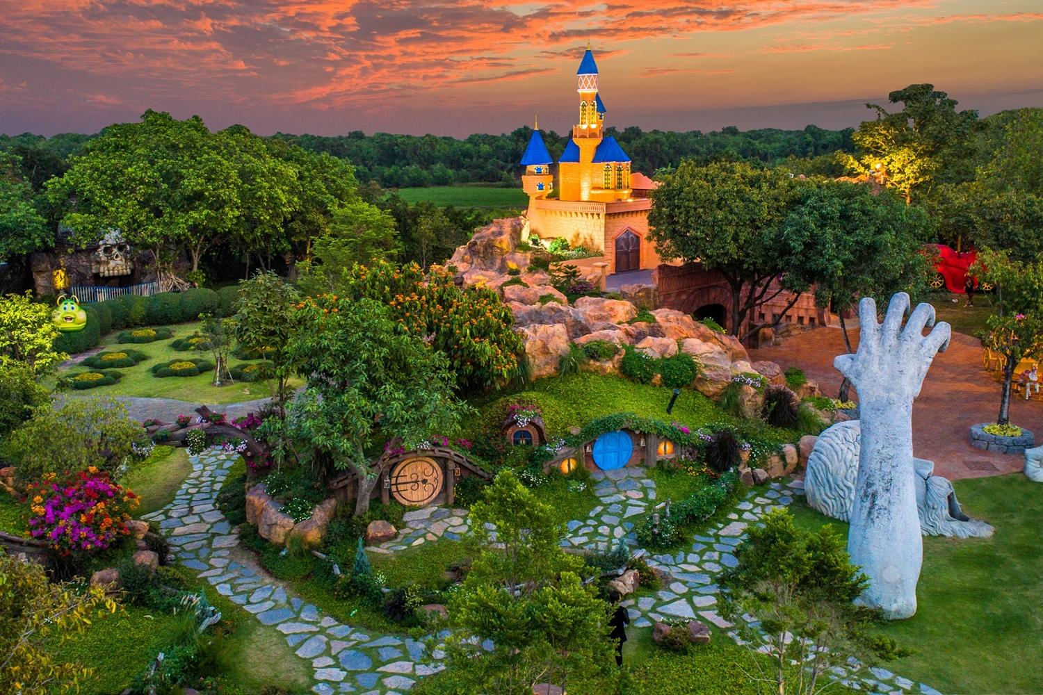A fairytale castle and landscaped gardens at a Bangkok theme park