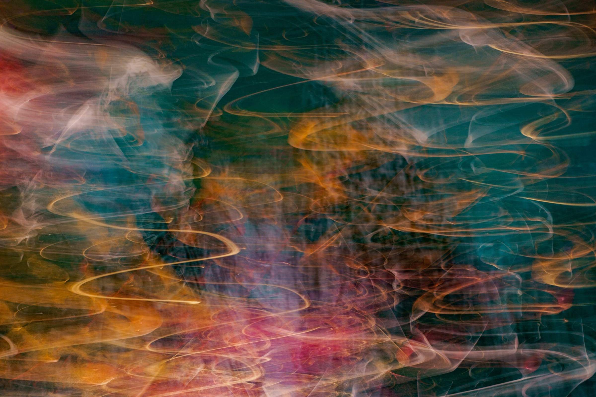 An abstract long-exposure of coloured light