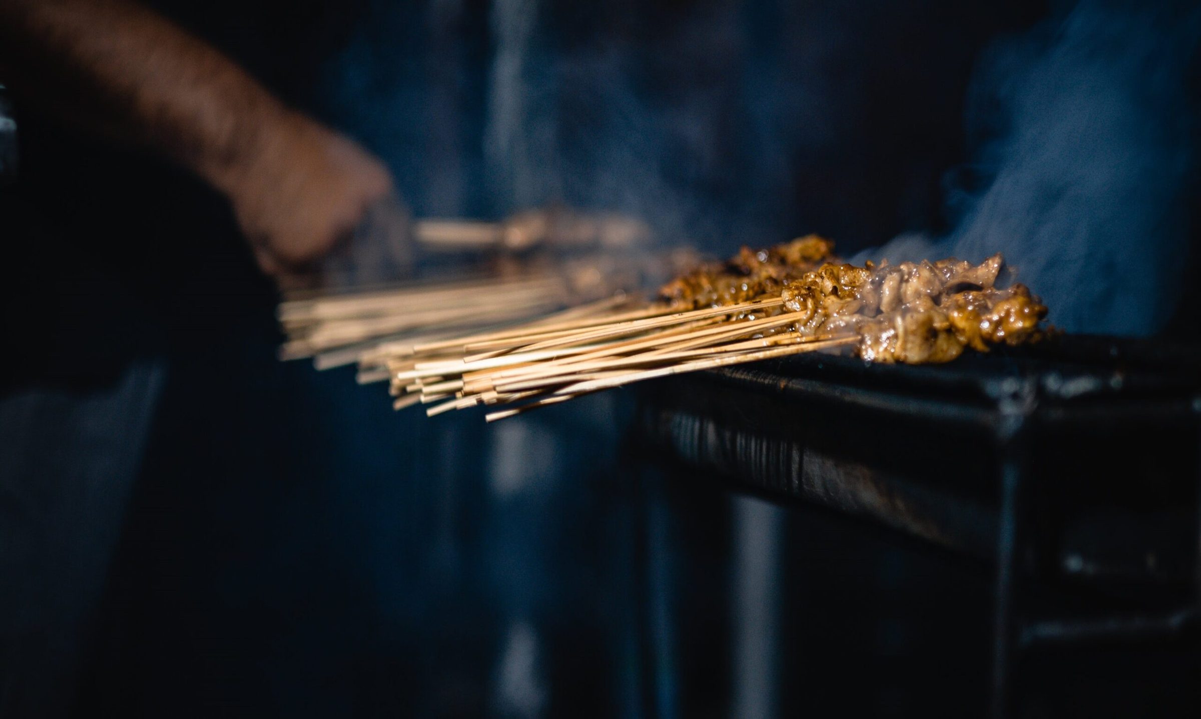 Grilled pork skewers, a Bangkok street food staple