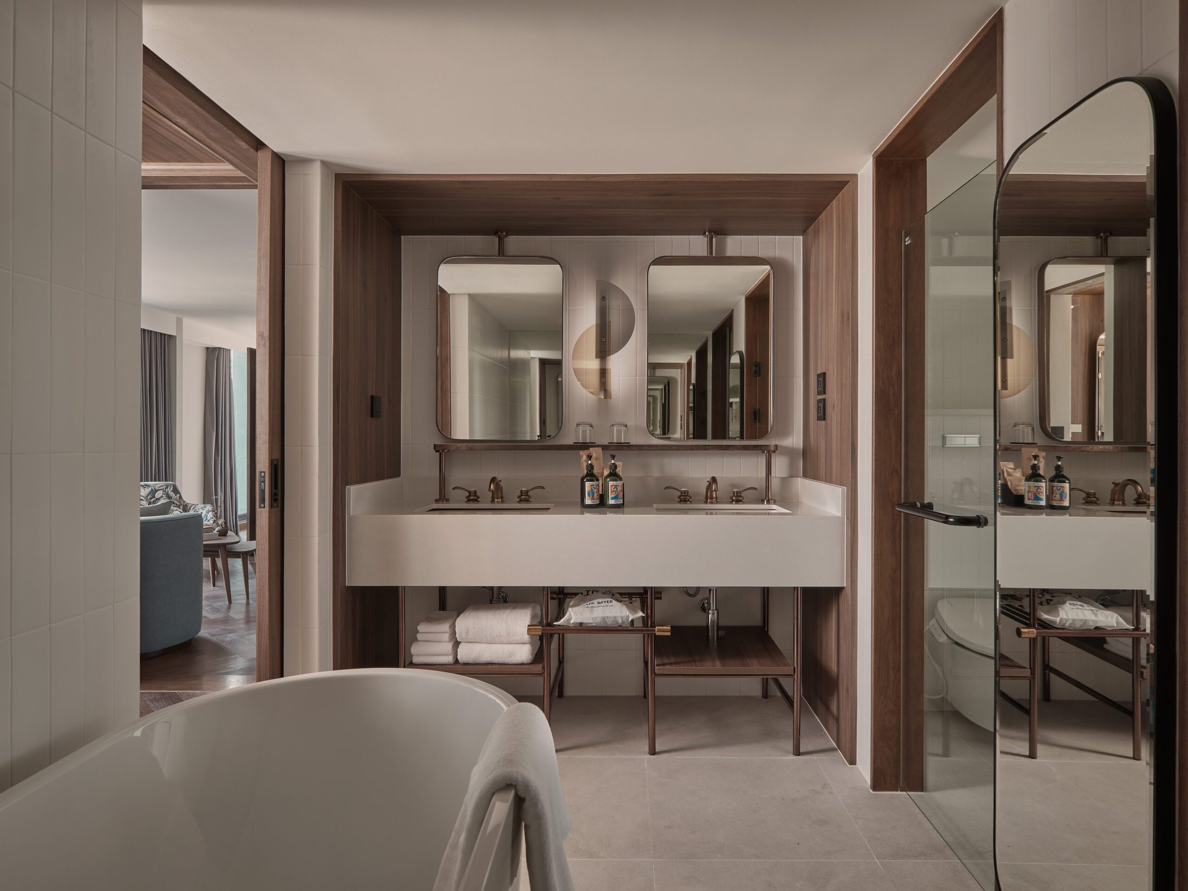 Executive Suite bathroom with a twin basin, bathtub and walk-in shower at Public House Bangkok