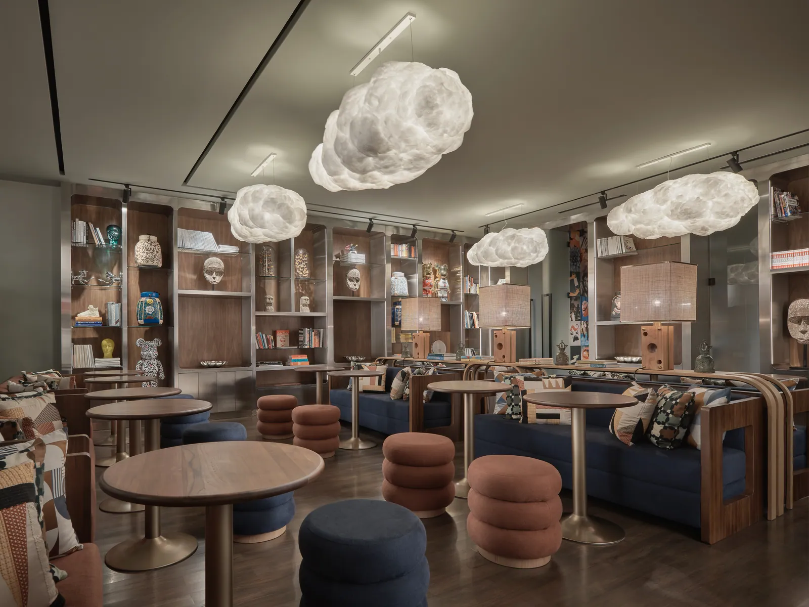 The co-working room at Public House Bangkok, with cloud pendant lights above low tables and banquettes