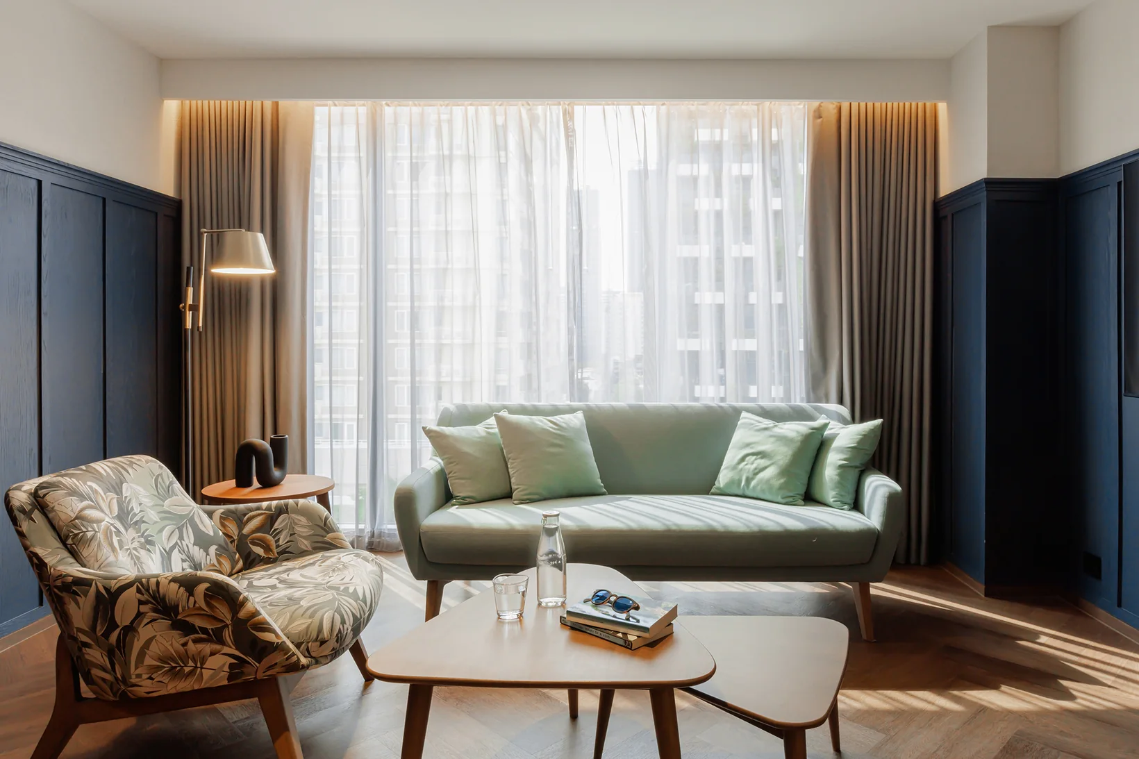 The living area of the Two-Bedroom Suite at Public House Bangkok
