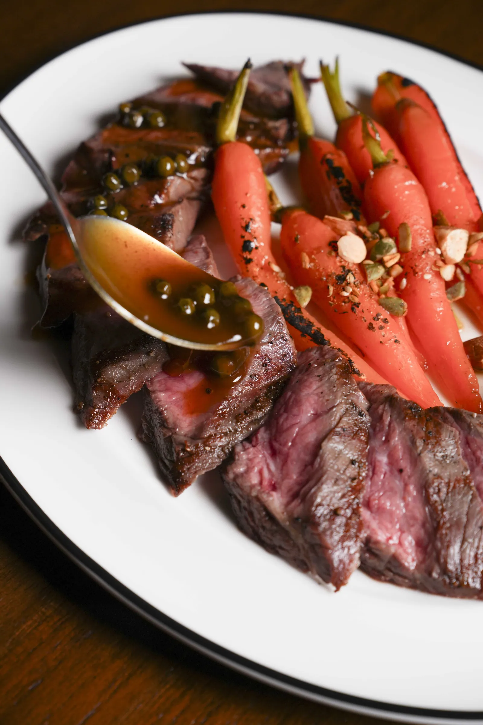 Josper-grilled wagyu flank steak at SWD Bangkok, served with glazed carrots